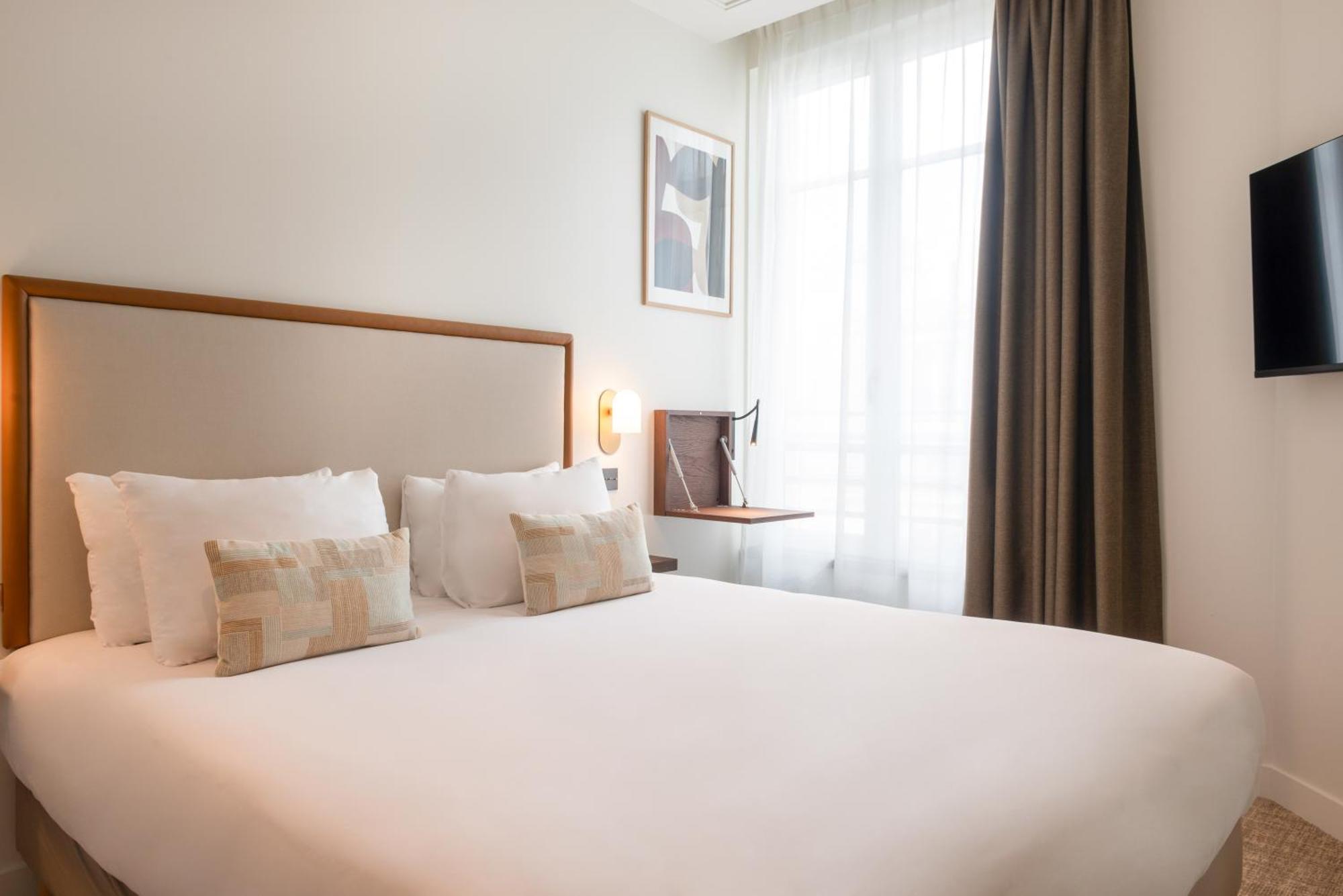 Le Lampika Hotel Париж Номер фото